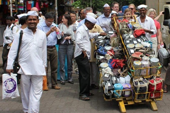 Dabbawala, Dhobi Ghat & Dharavi slum Tour with Local Train Ride - The dabbawalas: Mumbai’s lunch network