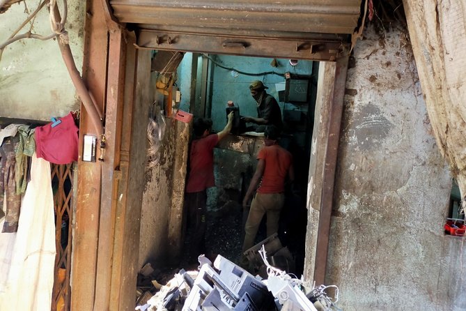 Dhobi Ghat (Open Air Laundry) with Dharavi Slum Guided Tour - Walking through Dharavi’s small industries