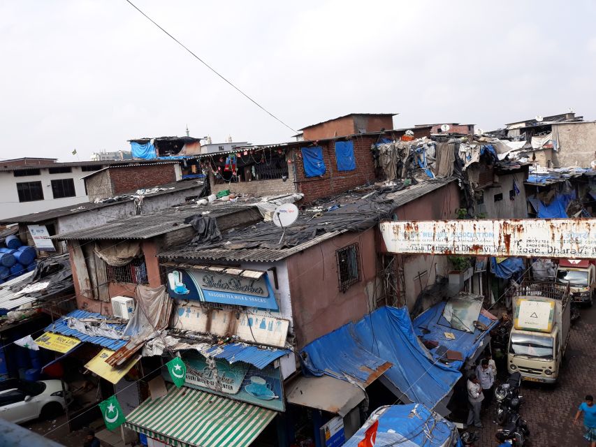 Mumbai: Dharavi Slum Walking Tour with Local Slum Dweller - A community lesson in shared religious life