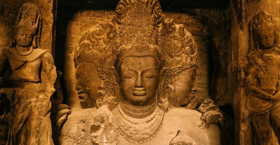 Mumbai: Elephanta Island and Elephanta Caves Guided Tour - Entering the ancient rock-cut temples