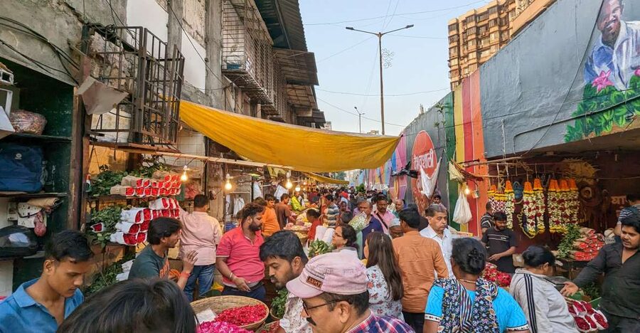 Mumbai Hidden Gems : Early Morning Tour with Expert Guide - Paper distribution near the train station