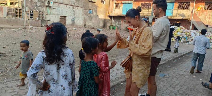 Mumbai: Private Dharavi Slum Tour by a Local with Pickup - Walking through a working community