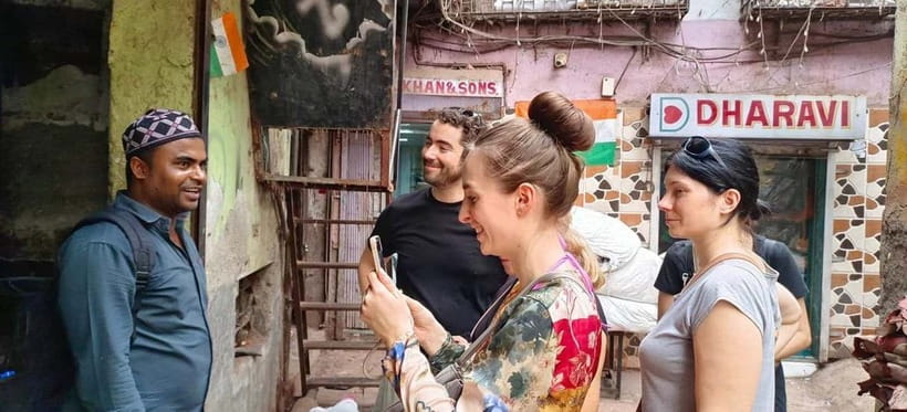 Mumbai: Private Dhobi Ghat Laundry & Slum Tour with Pickup - Walking through Dharavi’s working lanes