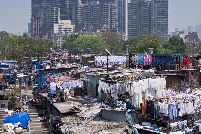 Private Dharavi Slum, Dabbawala & Dhobi Ghat tour with Transport - Guide quality and the value of a personal visit