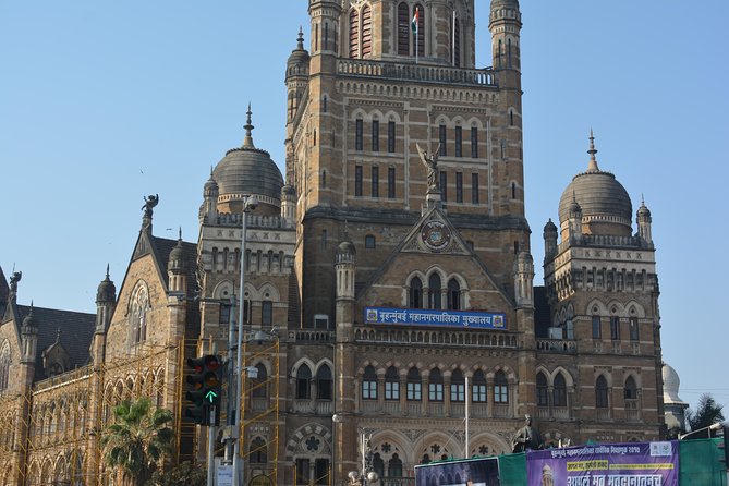 Two Days Mumbai Tour Package : City + Slum + Elephanta + Market - The Taj, Rajabai Tower, and Mumbai’s colonial skyline